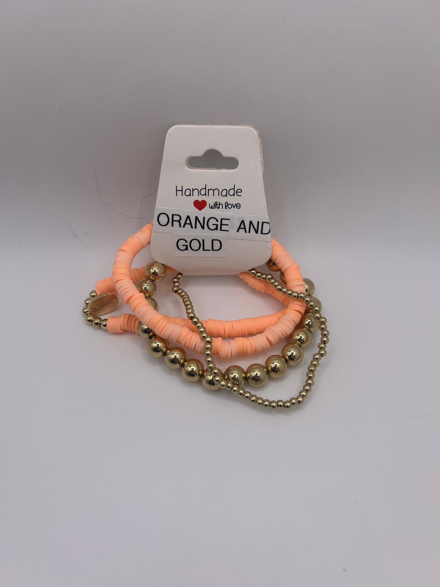 Orange and Gold Bracelets